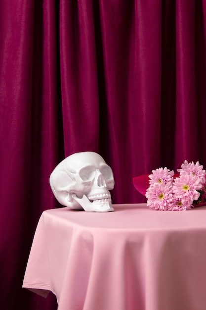 Free Photo view of white skull with flower vase