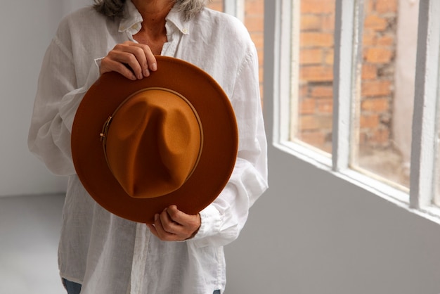 View of woman wearing stylish fedora hat