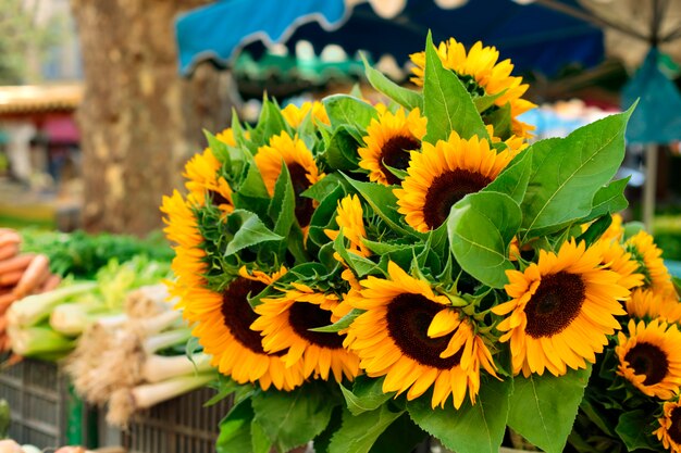 Village market with sunflowers