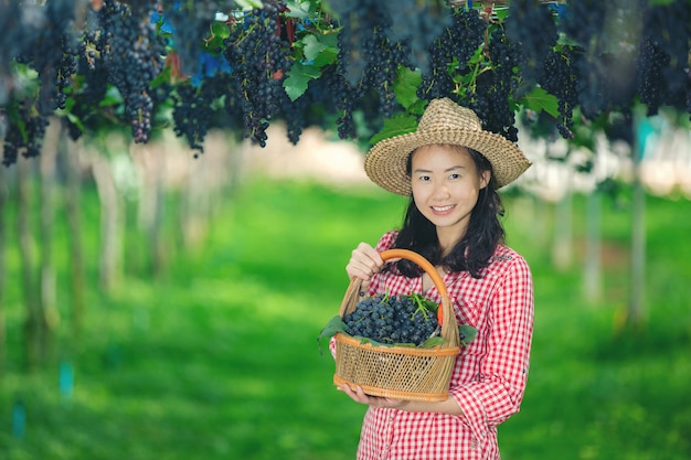 Vineyard farmers who smile and enjoy the harvest.