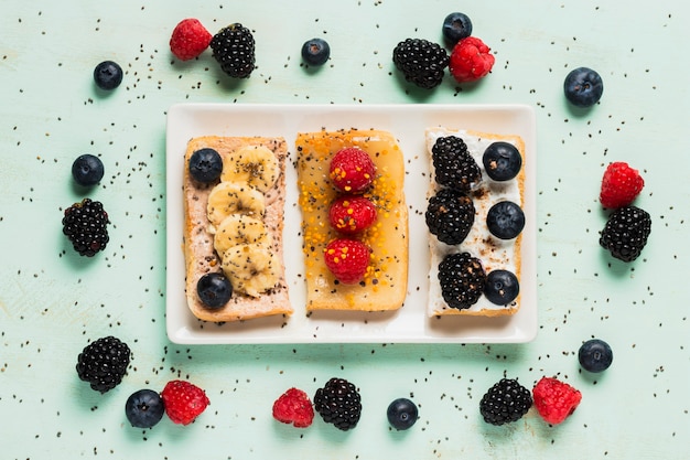 Free photo vintage breakfast with bananas and wild berries