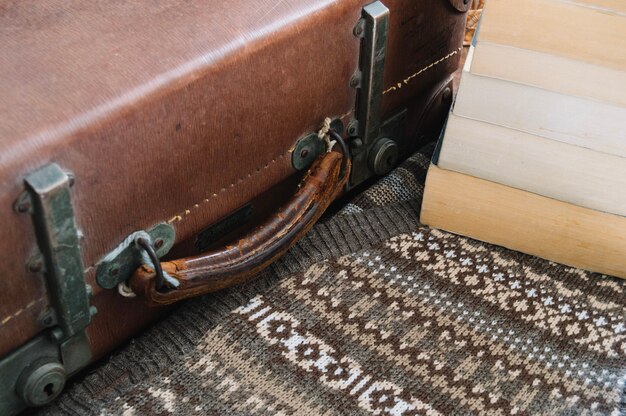 Vintage suitcase and books