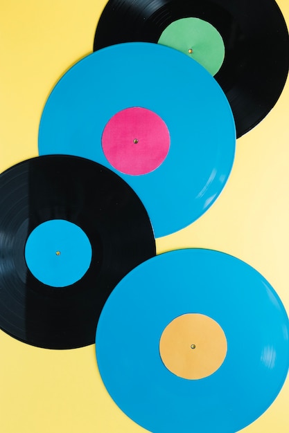 Vinyl records on yellow