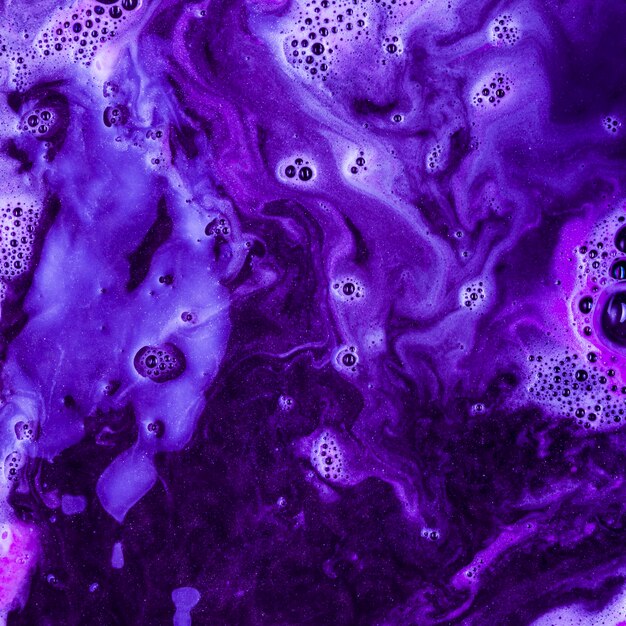 Violet liquid with light foam