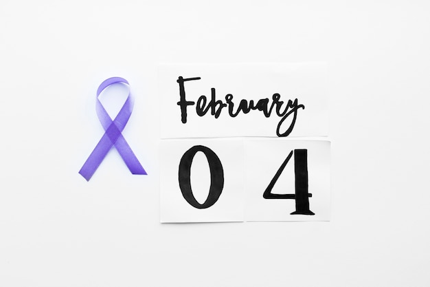 Free photo violet ribbon and february 4 writing