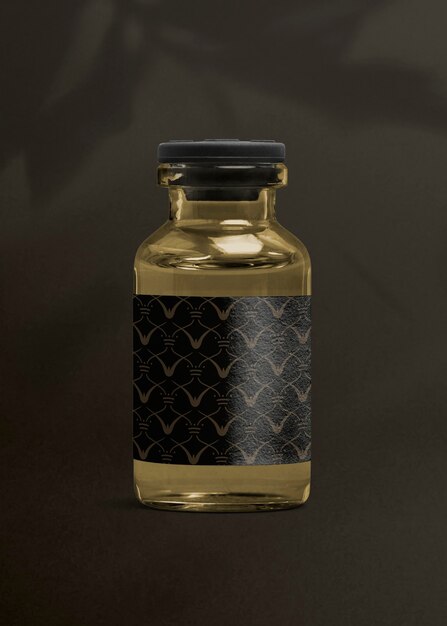 Vitamin injection glass bottle with luxurious black label for health and wellness product packaging