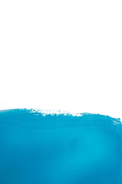 Vivid blue colored paint brushstroke