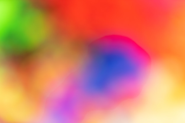 Free photo vivid blurred colorful wallpaper background