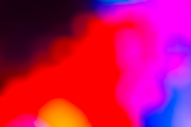 Free photo vivid blurred colorful wallpaper background