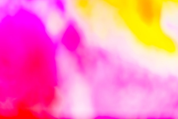 Free photo vivid blurred colorful wallpaper background