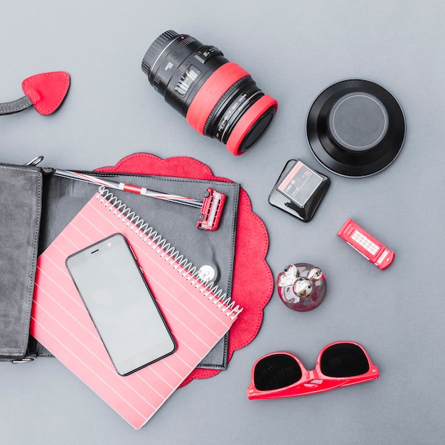 Free photo vivid traveler equipment on grey backdrop