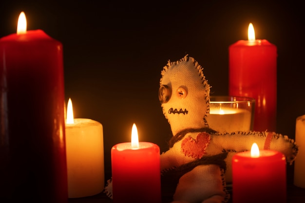 Free photo vodoo doll and candles arrangement