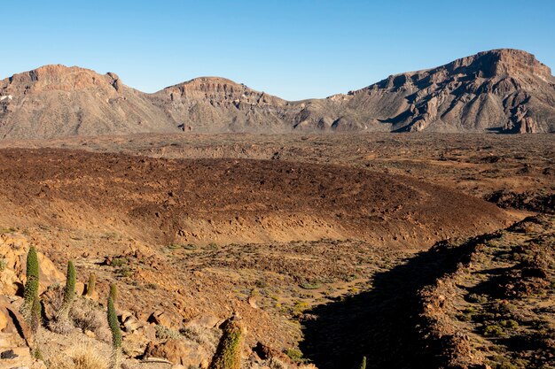 Volcanic crater with red soil 