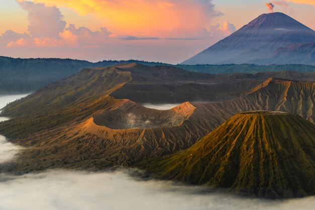 Volcano at sunrise with mist