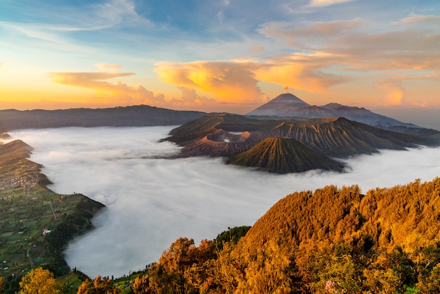 Free Photo volcano with mist at sunset