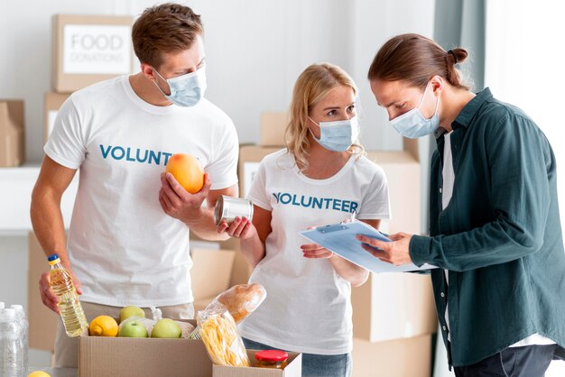 Volunteers helping and packing donations for world food day