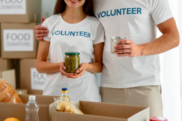 Free photo volunteers posing while hugging