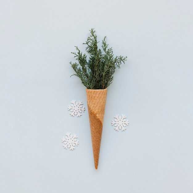 Waffle cone with green branches 