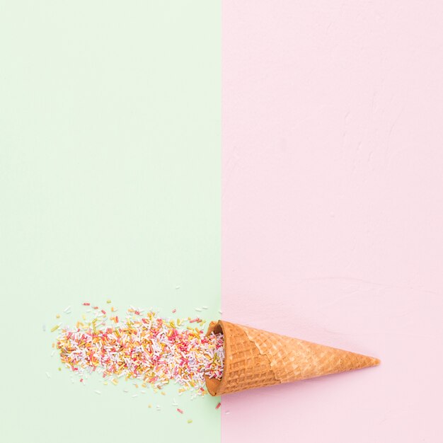 Waffle style sugar cone and rainbow sprinkles