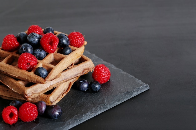 Waffles with raspberry and blueberry