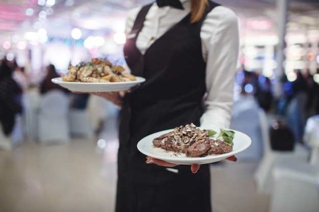 Free Photo waiter with meal catering service