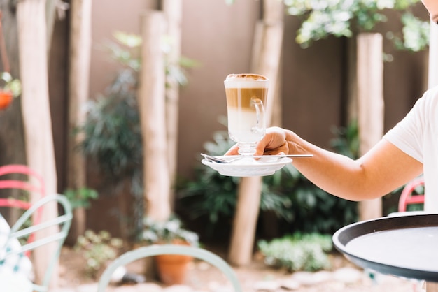 Waitress serving coffee