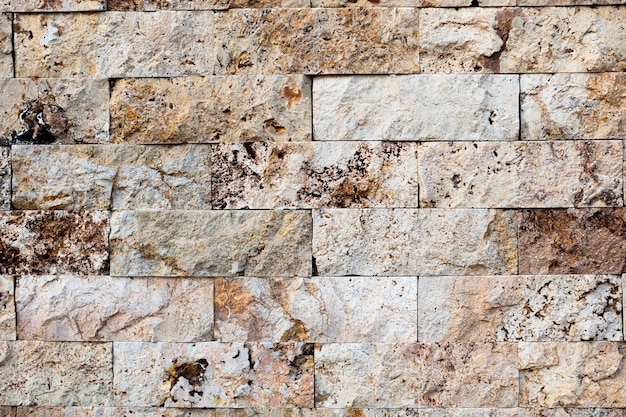 Free Photo wall of different stones texture for background