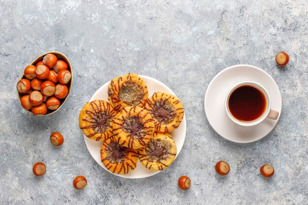 Walnut and chocolate cookies with walnuts around,top view