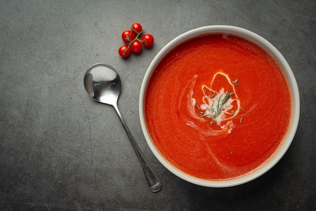 Warm tomato soup serve in bowl