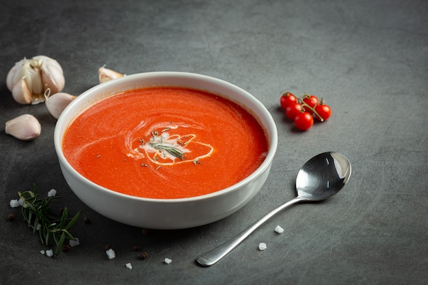 Warm tomato soup serve in bowl