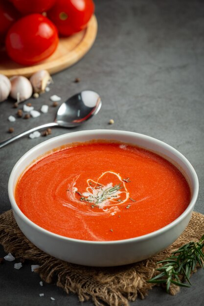 Warm tomato soup serve in bowl