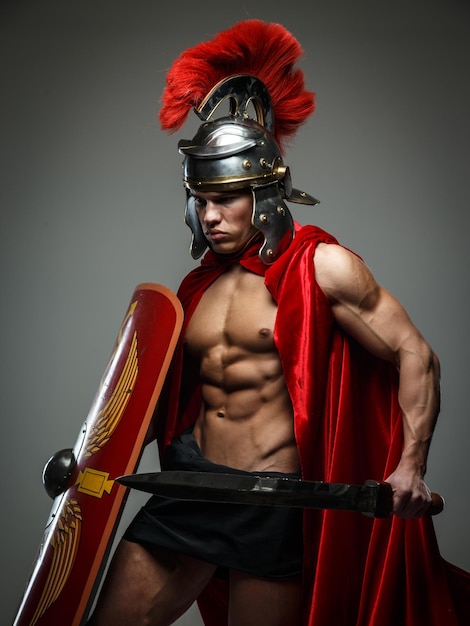 Free photo warrior of rome with sword and shield.