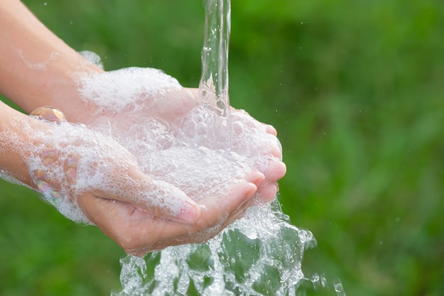 Washing hands with soap for prevent disease