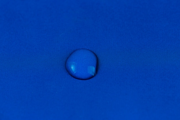 Free Photo water drop on blue background