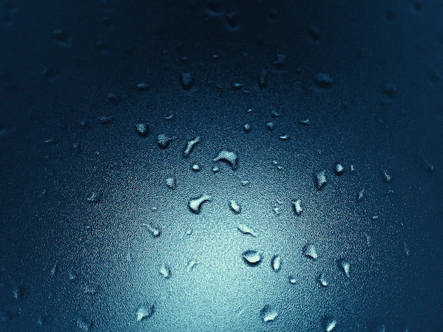 Free Photo water droplets pattern on clear glass