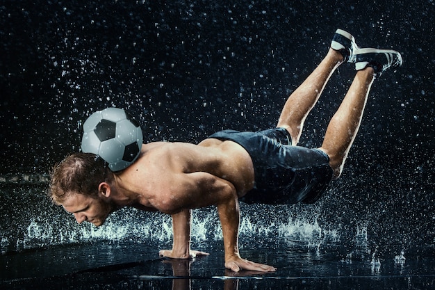 Water drops around football player