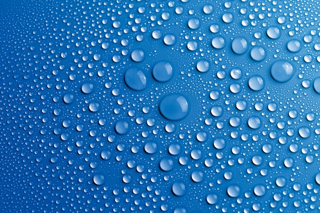 Free Photo water drops texture background, blue design