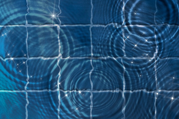 Free photo water ripple texture background, blue tiles