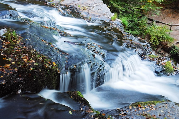 Free Photo waterfall over rocks