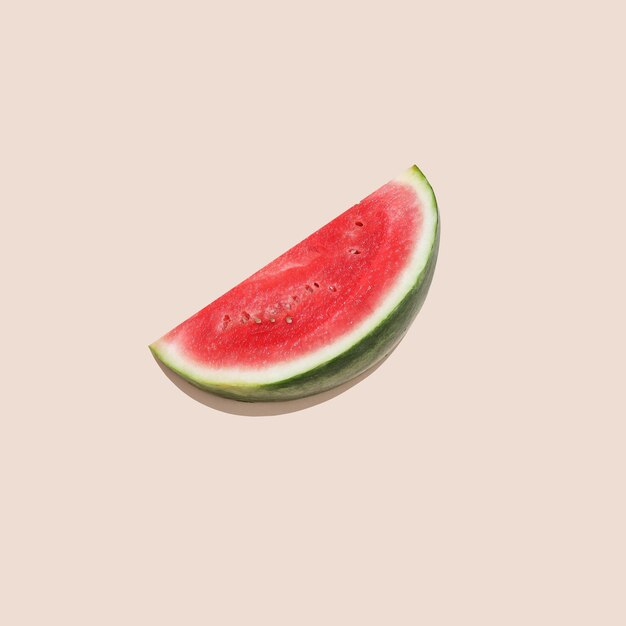 Watermelon cut on creamy background