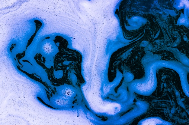 Free Photo waves of foam on blue liquid