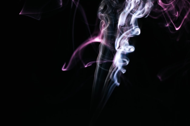 Wavy smoke on black background