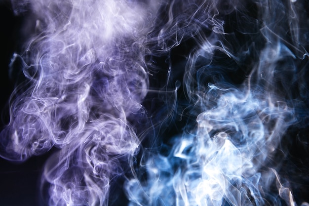 Wavy smoke on black background