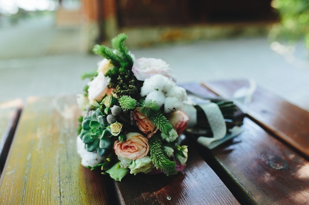 Wedding bouquet on a bench, close view