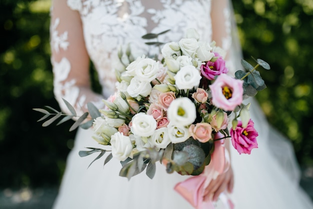 wedding bouquet in bride's hands