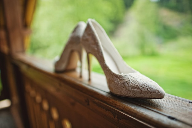 Wedding bride shoes textile at the balkony