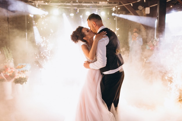 Free photo wedding couple dancing their first dance