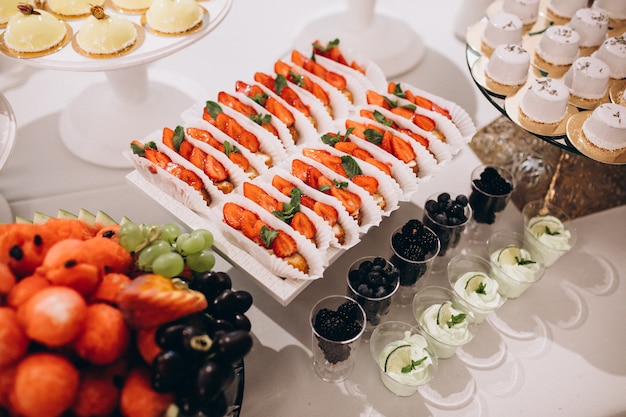 Free Photo wedding decorated dessert table in a restaurant