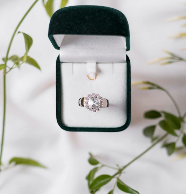 Free photo wedding ring and box above view