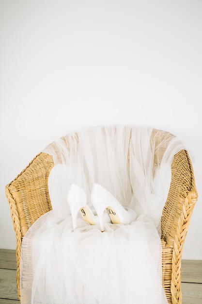 Wedding shoes in an armchair